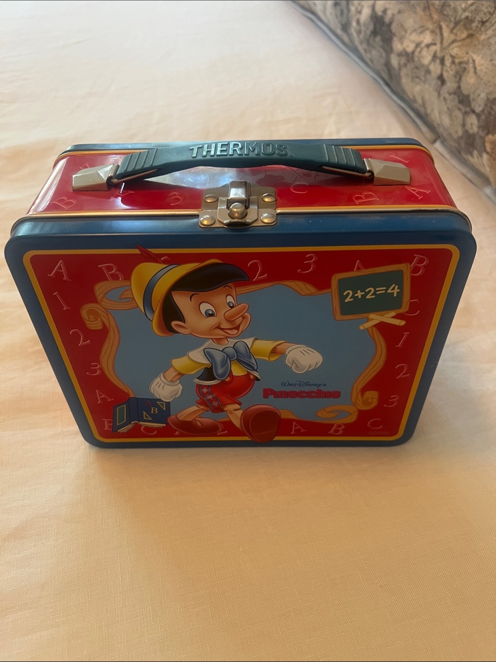 1998 vintage Thermos Pinocchio Disney Tin Lunchbox with all parts. Unused.